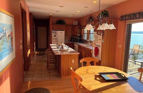 Kewadin House | "Luxurious 4BR/4BA Retreat on Torch Lake - Perfect for Families"