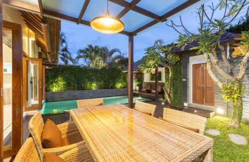 Sunset Road Villa | Luxurious and Cozy King Beds, Pool, closed living room