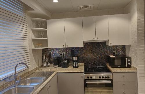 Madinat Zayed Apartment | Luxury 2 BD, A Midtown Quintessential Community