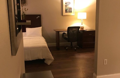 Killeen Apartment | Luxury 2 Bedroom Suite, Sleeps 7, Incl. Breakfast, Pool, BBQ, Family Activities