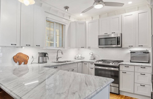 Bryant House | Luxury 3BR, 2 Full + 2 Half Baths/Walk to Elmwood/Garage/EV Charger/AC