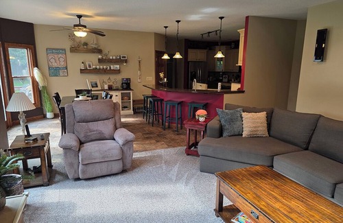 Geneseo House | Luxury 5 BR home on private wooded lot near QC, w/hot tub, rec & fitness room