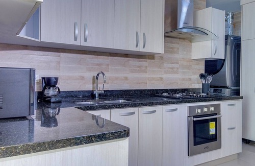 Urbanizacion Eliana Condo | Luxury Airport Penthouse 3 BD 2 BTH + Rooftop Pool