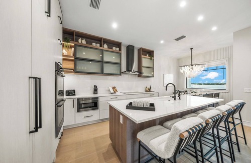 Bradenton Beach House | Luxury Bayfront Home, Rooftop Deck, Pool, Dog Friendly - Hook Wine and Sinker