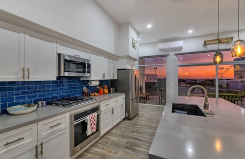 Laguna Shores House | Luxury Beachfront Oceanview 4 Bed Home in Laguna Shores Pools Pickleball Kayaks