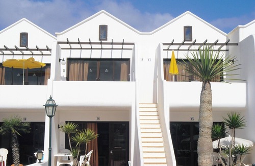 Costa Teguise Apartment | Luxury beachside villa with stunning sea views. Seven pools on complex!