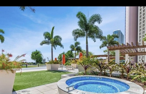 Downtown Honolulu Apartment | Luxury Condo with full view of the Ocean, Lanai, Pool, Hot Tub, Gym & Playground