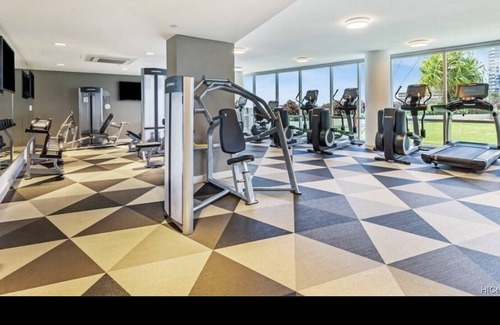 Downtown Honolulu Apartment | Luxury Condo with full view of the Ocean, Lanai, Pool, Hot Tub, Gym & Playground
