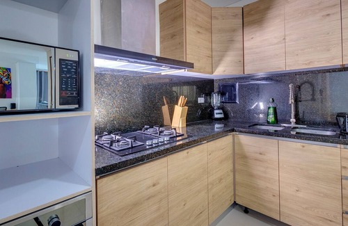 Crespo Condo | Luxury CTG Airport Penthouse 3 BD 2 BA Suite + Rooftop Pool