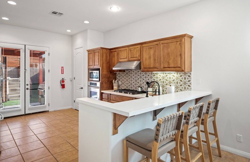 Desert Hot Springs House | Luxury Desert Pueblo! Heated Pool, Spa, Game Room, Koi Pond, Movie Screen