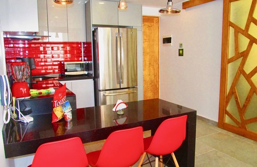 Luis Donaldo Colosio Condo | Luxury Fifth Avenue Studio with Stunning Roof Top Pool