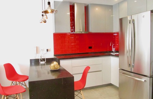 Luis Donaldo Colosio Condo | Luxury Fifth Avenue Studio with Stunning Roof Top Pool