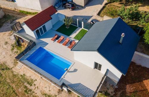 Zavala Villa | Luxury Grey house