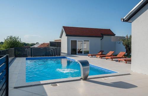 Zavala Villa | Luxury Grey house