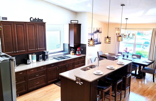 Northwest Calgary House | Luxury Home, 5BR, 2King, HotTub, Movie Theater, Game Room, Play Room and More