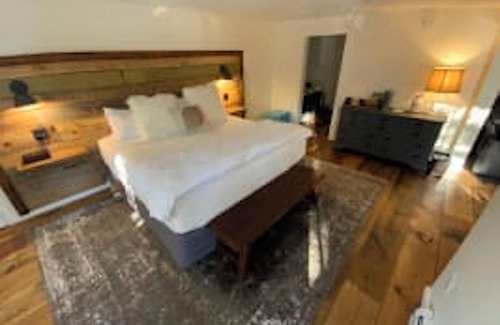 West Dover Resort | Luxury King Suite, Living Room w/sofa bed, balcony, & 1.5 baths