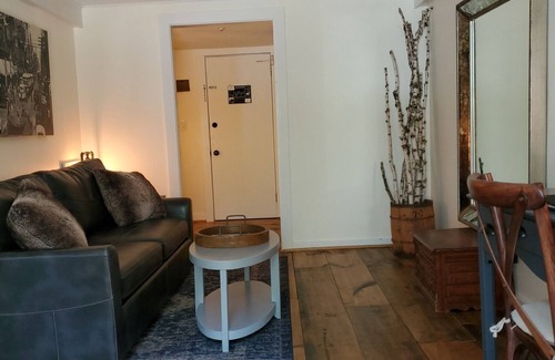 West Dover Resort | Luxury King Suite, Living Room w/sofa bed, balcony, & 1.5 baths