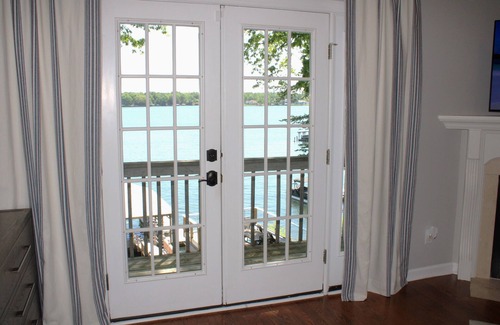 Terrell House | Luxury lakefront home with a covered private dock & large game room