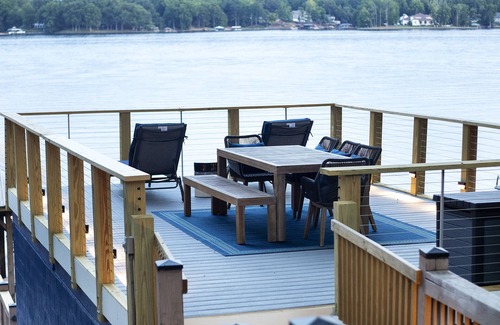 Terrell House | Luxury lakefront home with a covered private dock & large game room