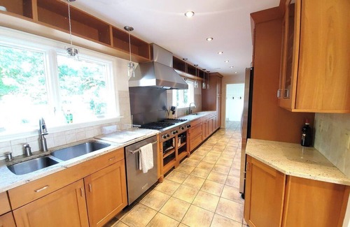 Ashtabula House | Luxury Lakefront Retreat: Panoramic Views, Game Room, Fire Pit Swings & More