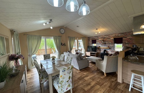 Tattershall Cabin | luxury lakeside lodge with a sunken hot tub on bull rush a peaceful feature lake @Tattershall lakes