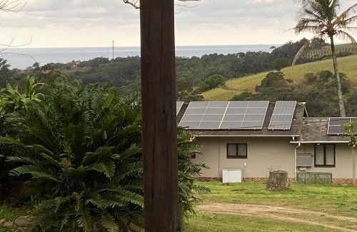 Hibiscus Coast Villa | Luxury modern farm cottage with sea view