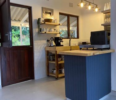 Hibiscus Coast Villa | Luxury modern farm cottage with sea view