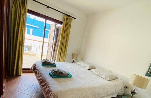 Playa de Mogan Apartment | Luxury penthouse in town center Puerto Mogan with ocean and beach views.