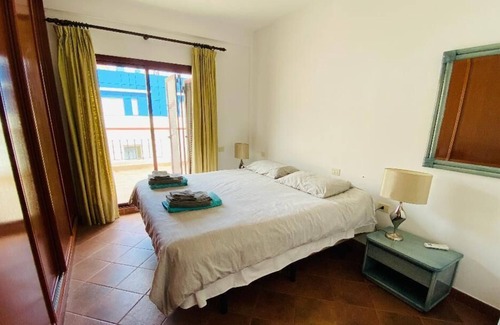 Playa de Mogan Apartment | Luxury penthouse in town center Puerto Mogan with ocean and beach views.