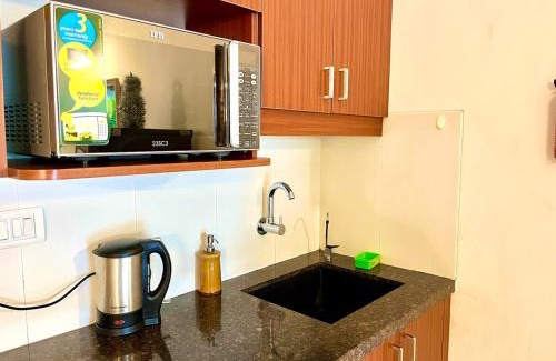 Siolim Apartment | Luxury Pool Side Studio With Private Balcony