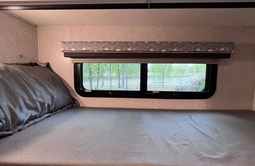 Walker House | Luxury RV with Bunkbeds Stationed on serene Grand River with private golf course