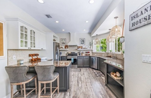 Twin Lakes House | Luxury Water Front Home, Private Pool, Spa, Tiki Bar, 37' Foot Dock with Kayaks