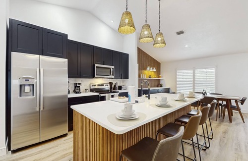 Melbourne House | Luxury waterfront home with private pool, hot tub, patio and WIFI