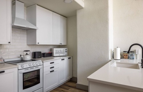 West Main Historic District Condo | Main Street Farmhouse. City Retreat by Hollyhock