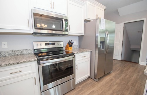 Dadeville House | Majestic Lakefront Home Awesome boathouse, Sandy beach, Decks, Amenities galore!