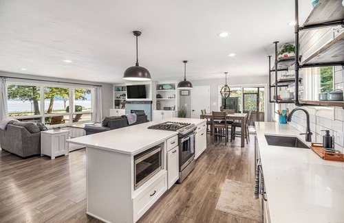 Traverse City House | Majestic Views of West Bay and OMP. Remodeled Waterfront Home. Awesome Location.