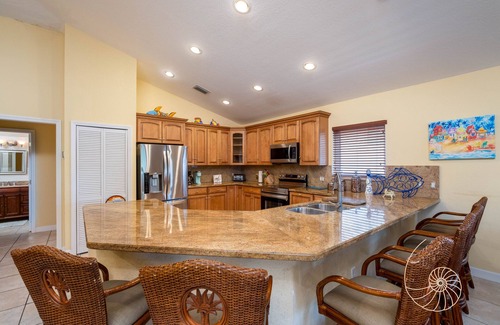 Indian Waterways House | Manatee Manor ~ 3 Bedroom Island Home on Plantation Key with Pool & Dockage