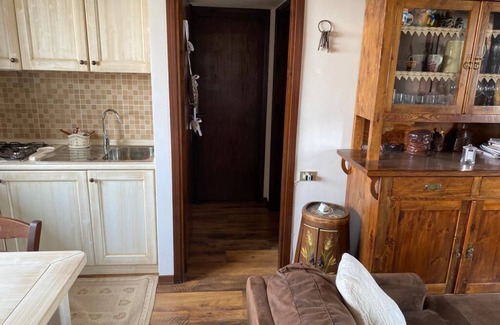 Conco Apartment | Mansarda Le Laite by Ca-Sa Check