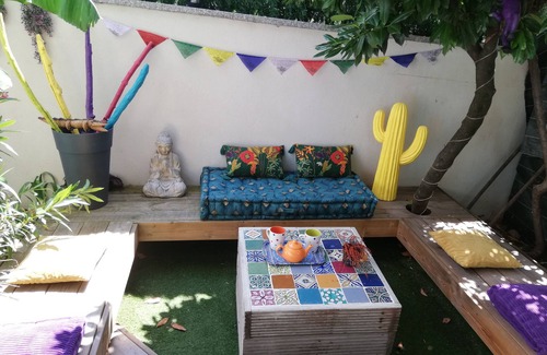 Aix-les-Bains City Center Apartment | Marie's patio in bloom