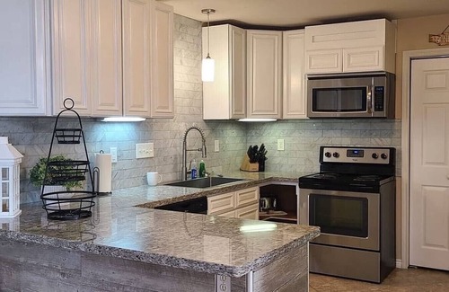 Matagorda Cottage | Matagorda Hidden GemRiver front night light onDock Family beach & fishing trips!