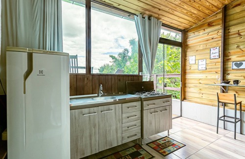 Jurere Ski Chalet | MAV Chalés Rusticos vista parcial do Mar