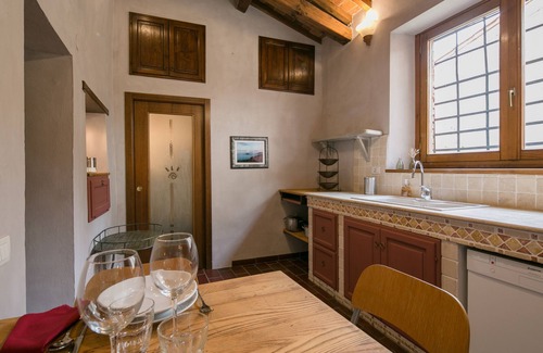 Castiglion Fiorentino Apartment | Medieval Delight! Balcony, Rustic Beams & Brick Fireplace w/Modern Amenities