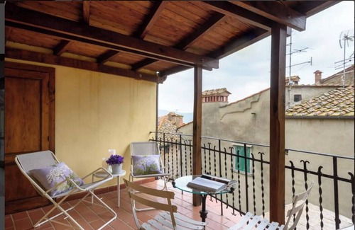 Castiglion Fiorentino Apartment | Medieval Delight! Balcony, Rustic Beams & Brick Fireplace w/Modern Amenities