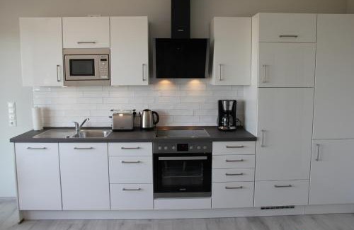 Fehmarnsund Apartment | Meerblick Fehmarnsund 1 - direkt am Strand