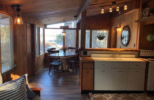 Meredith House | Meredith streamside cottage next to beach