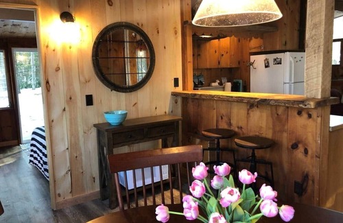 Meredith House | Meredith streamside cottage next to beach