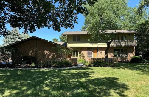 South Central Omaha House | Mid-Century Manor, nostalgic, luxurious filled with entertainment