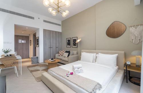 Jumeirah Village Circle Apartment | Minimalist Studio With Nature-Inspired Balcony in JVC