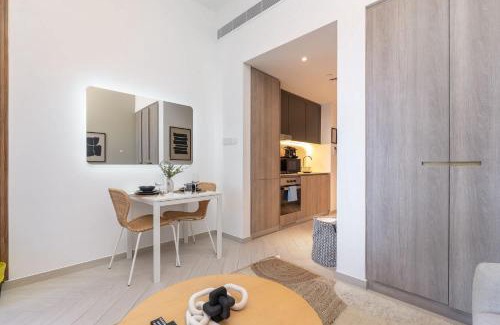Jumeirah Village Circle Apartment | Minimalist Studio With Nature-Inspired Balcony in JVC