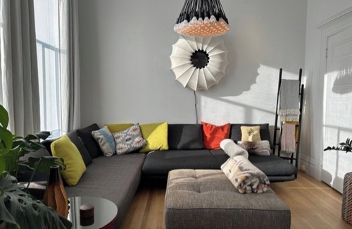 Mission District Apartment | Mission jewel box filled with art and classic furniture, Garage parking & AC